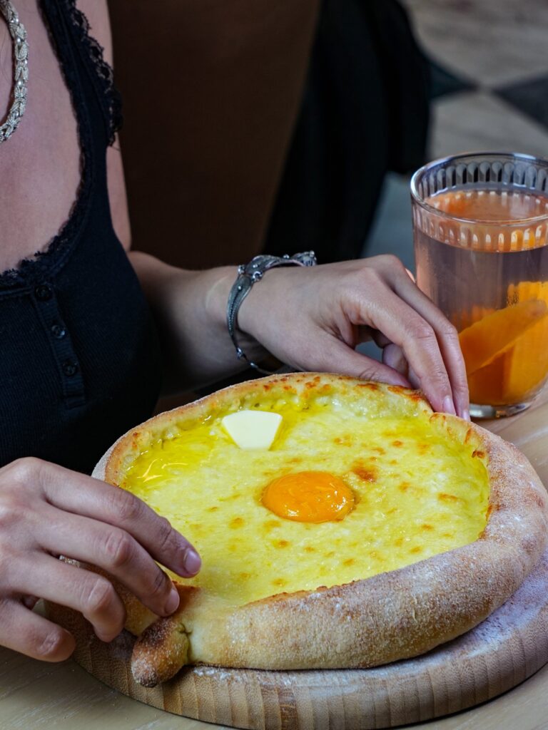 Adjarian khachapuri at the table, Vakhtanguri restaurant