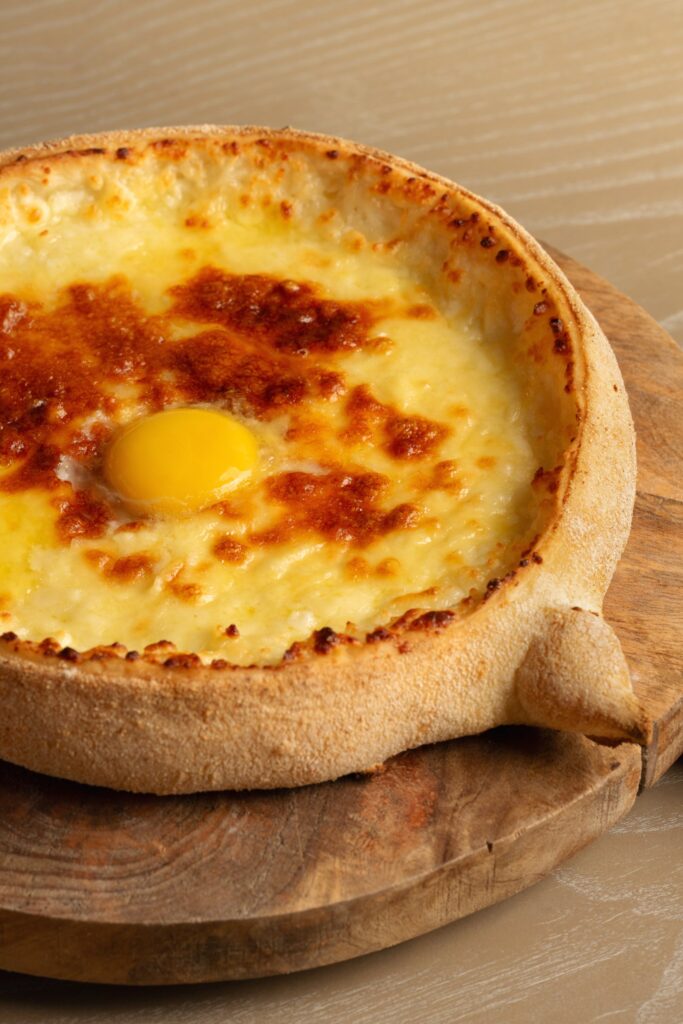 Adjarian khachapuri with an egg yolk, close-up